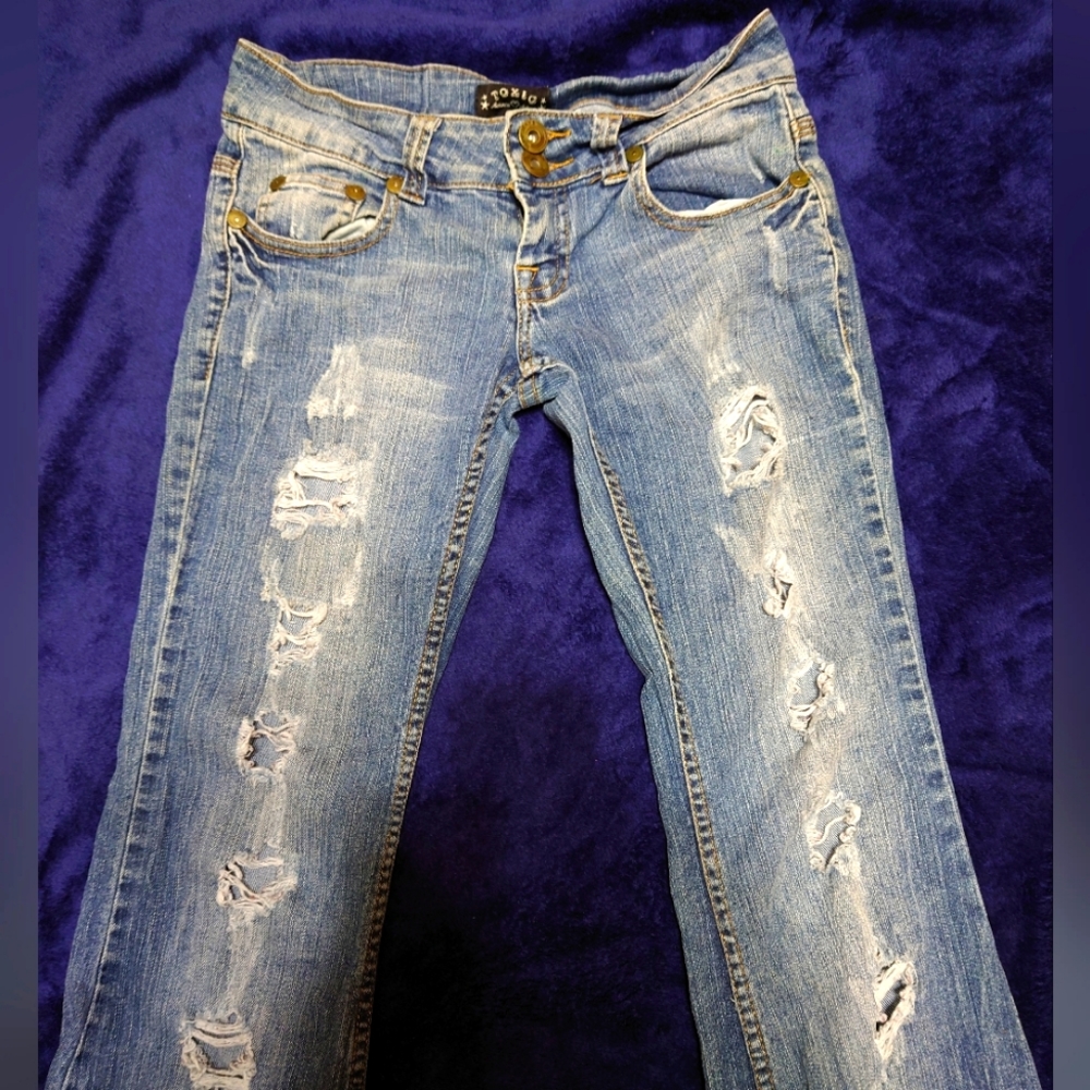 Ripped flared jeans